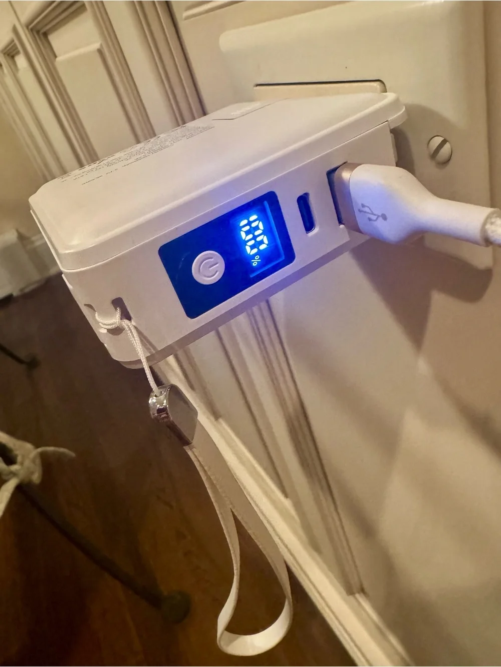 Portable White Travel Charger with Wireless Pad and Plug Adapters
